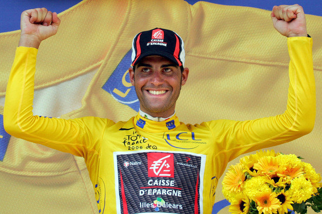 ** FILE ** Spanish rider Oscar Pereiro is seen celebrating on the podium in this July 15, 2006 file photo during the Tour de France cycling race in Montelimar, southern France. Pereiro, who came second to U.S. rider Floyd Landis in the 2006 Tour de France now stands to inherit the title after tests showed the American champion used synthetic testosterone to fuel his spectacular comeback victory. Floyd Landis of the U.S. lost his expensive and explosive doping case Thursday Sept. 20, 2007 when the arbitrators upheld the results of a test that showed the 2006 Tour de France champion used synthetic testosterone to fuel his spectacular comeback victory, The Associated Press has learned. (AP Photo/Alessandro Trovati)